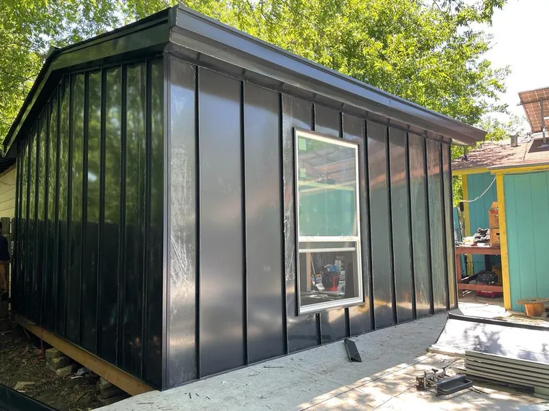 Black standing seam metal wall panels for Metal Roof Installation in Coal City